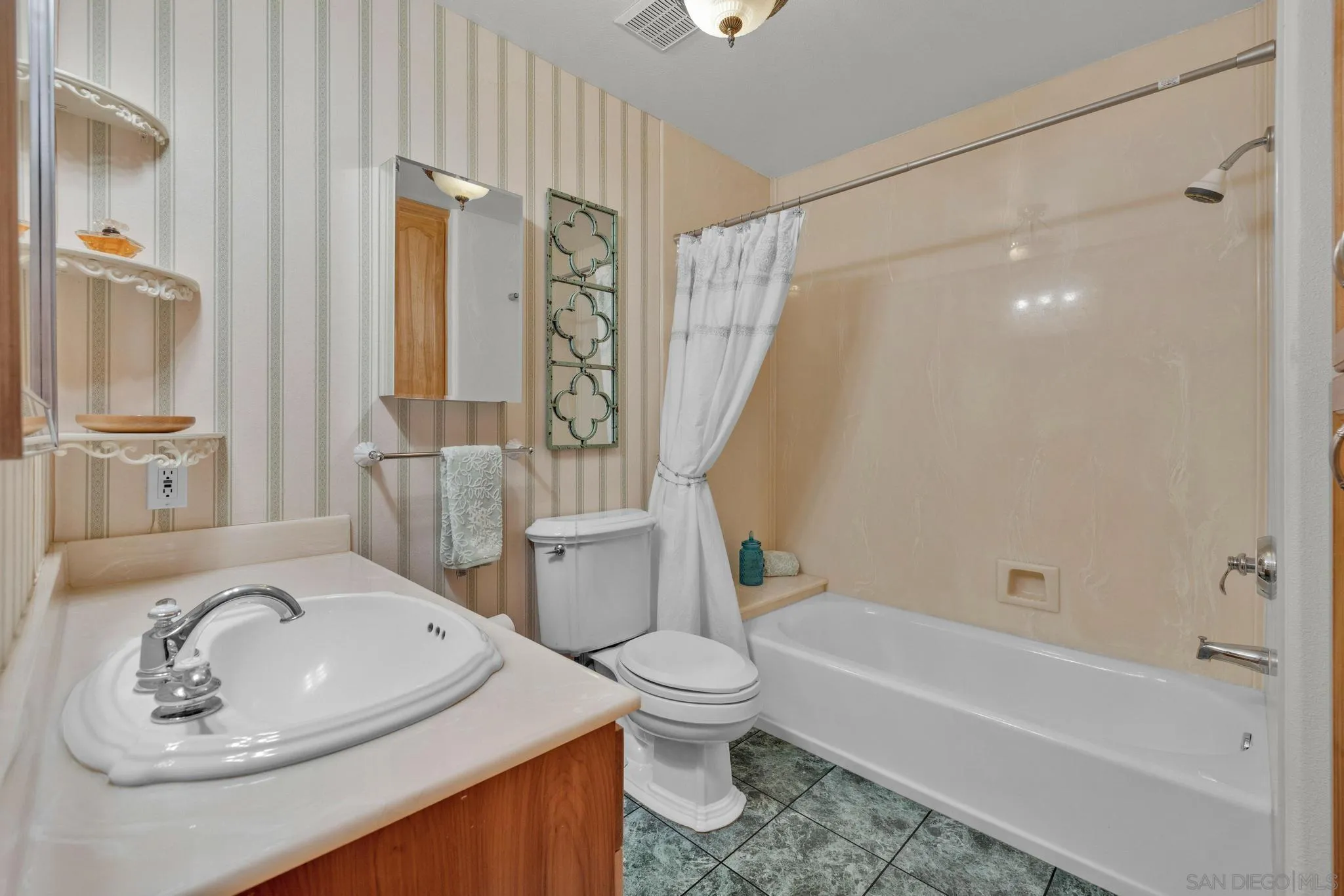 4819 Pine Ridge Avenue Julian, CA 92036 - Photo 22 of 51 a bathroom with a sink toilet and shower