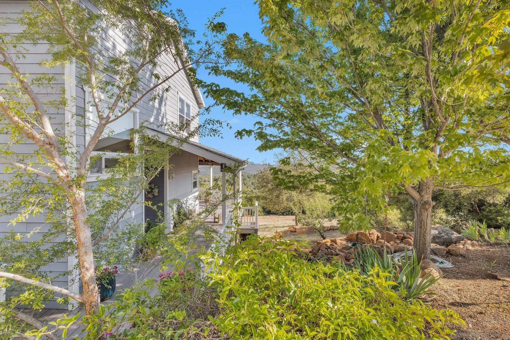4819 Pine Ridge Avenue Julian, CA 92036 - Photo 36 of 51 a backyard of a house with table and chairs
