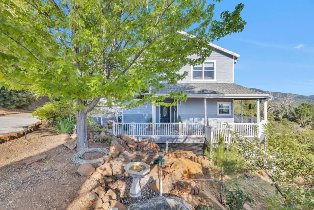 a view of ocean and mountain