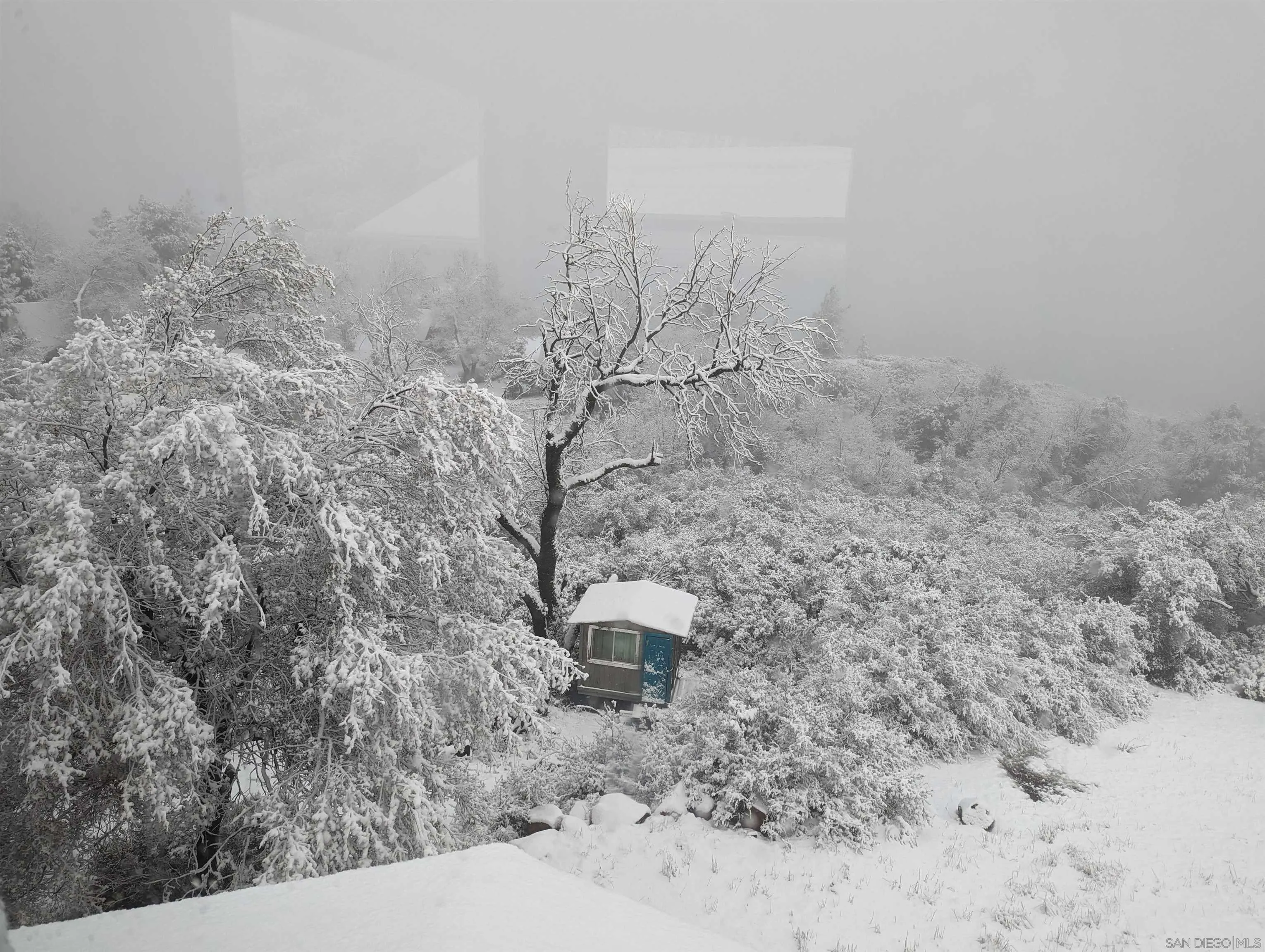 4819 Pine Ridge Avenue Julian, CA 92036 - Photo 51 of 51 a view of a dry yard with wooden fence