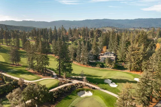 a view of a city with mountains in the background
