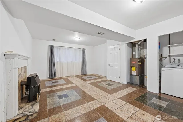 a view of a bedroom with a furniture and closet