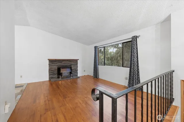 a view of livingroom with furniture and fireplace