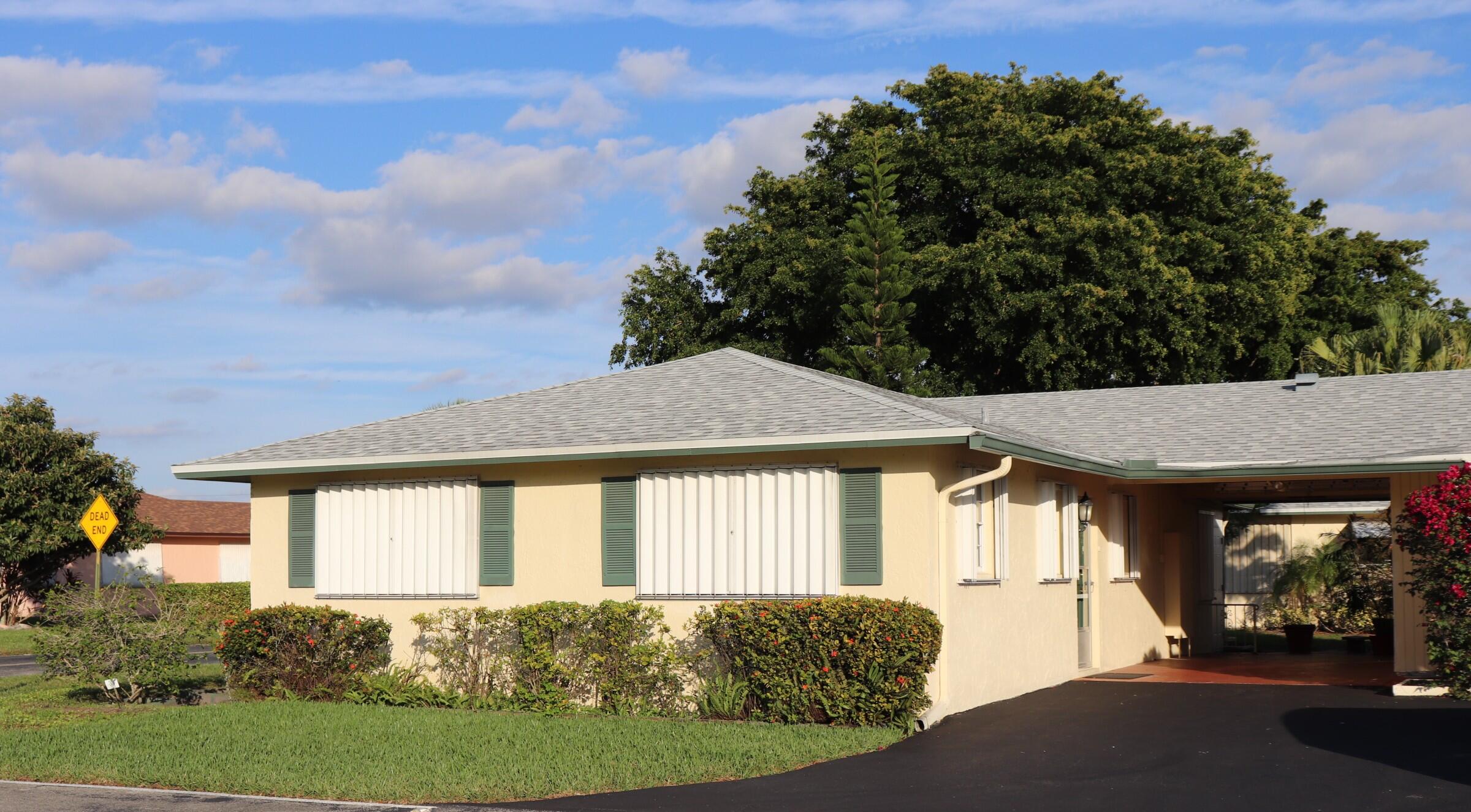 201 Cardinal Lane Delray Beach, FL 33445 - Photo 1 of 22 Front