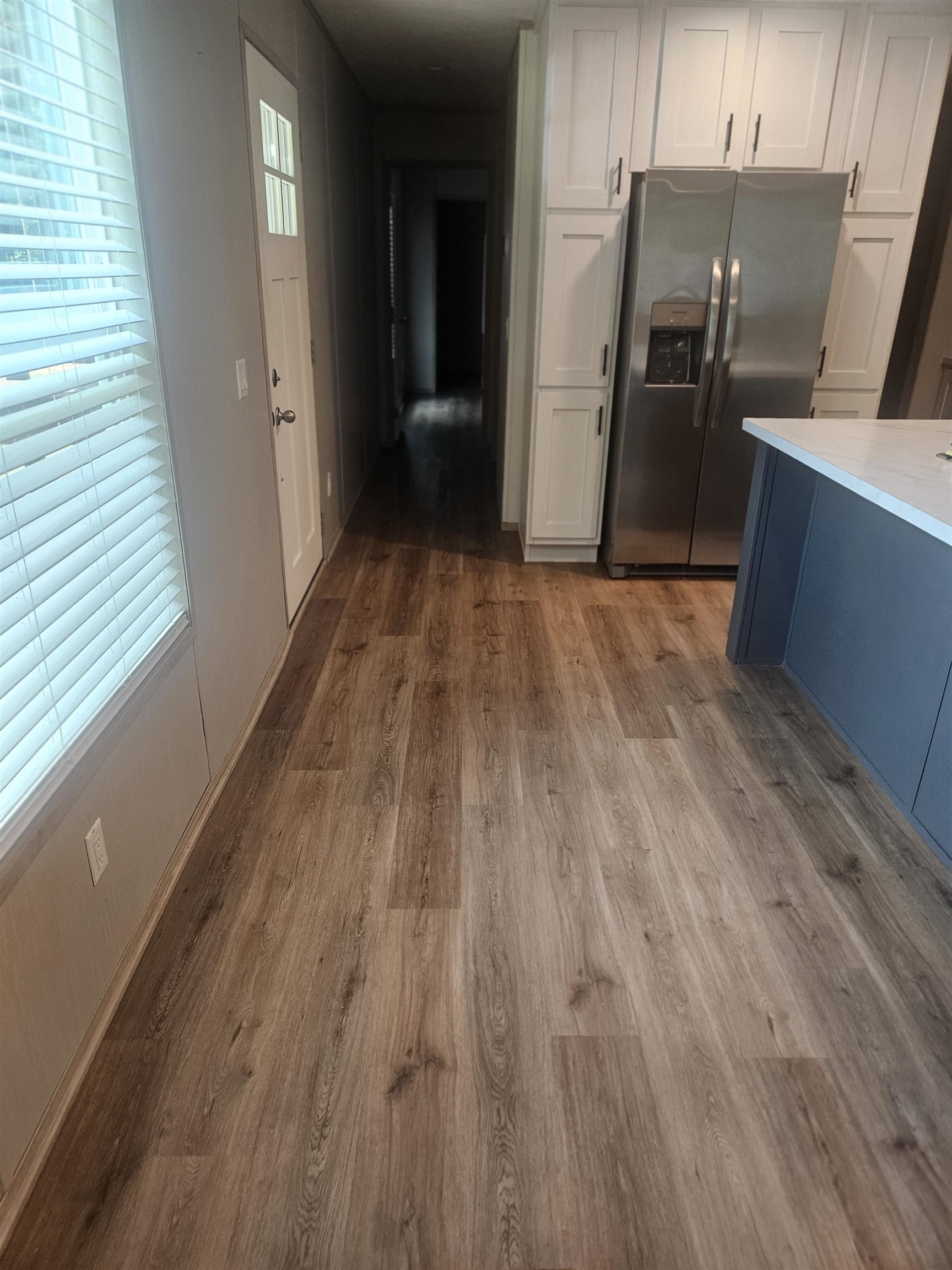 75 Pittman Road, Unit ROAD Somerville, TN 38068 - Photo 9 of 26 Wood-finish flooring extending throughout the space