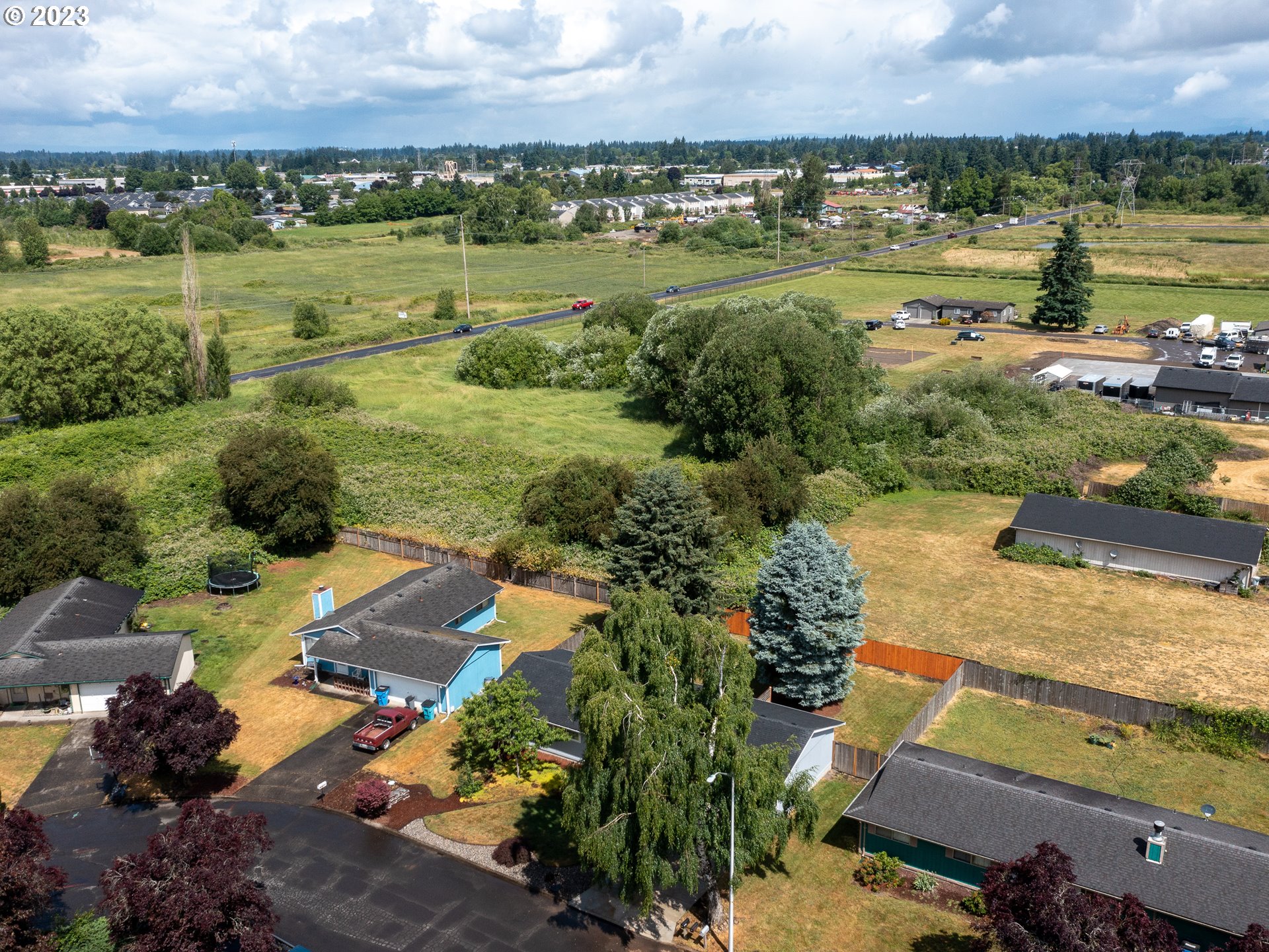 5208 Northeast 139th Loop Vancouver, WA 98682 - Photo 35 of 37 an aerial view of residential houses with outdoor space and lake view