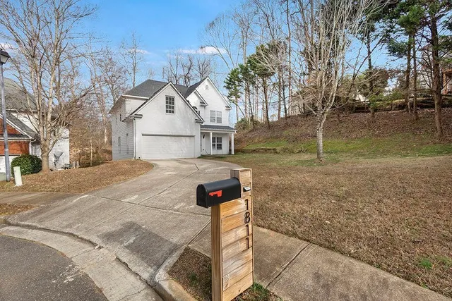 a backyard of a house with lots of green space