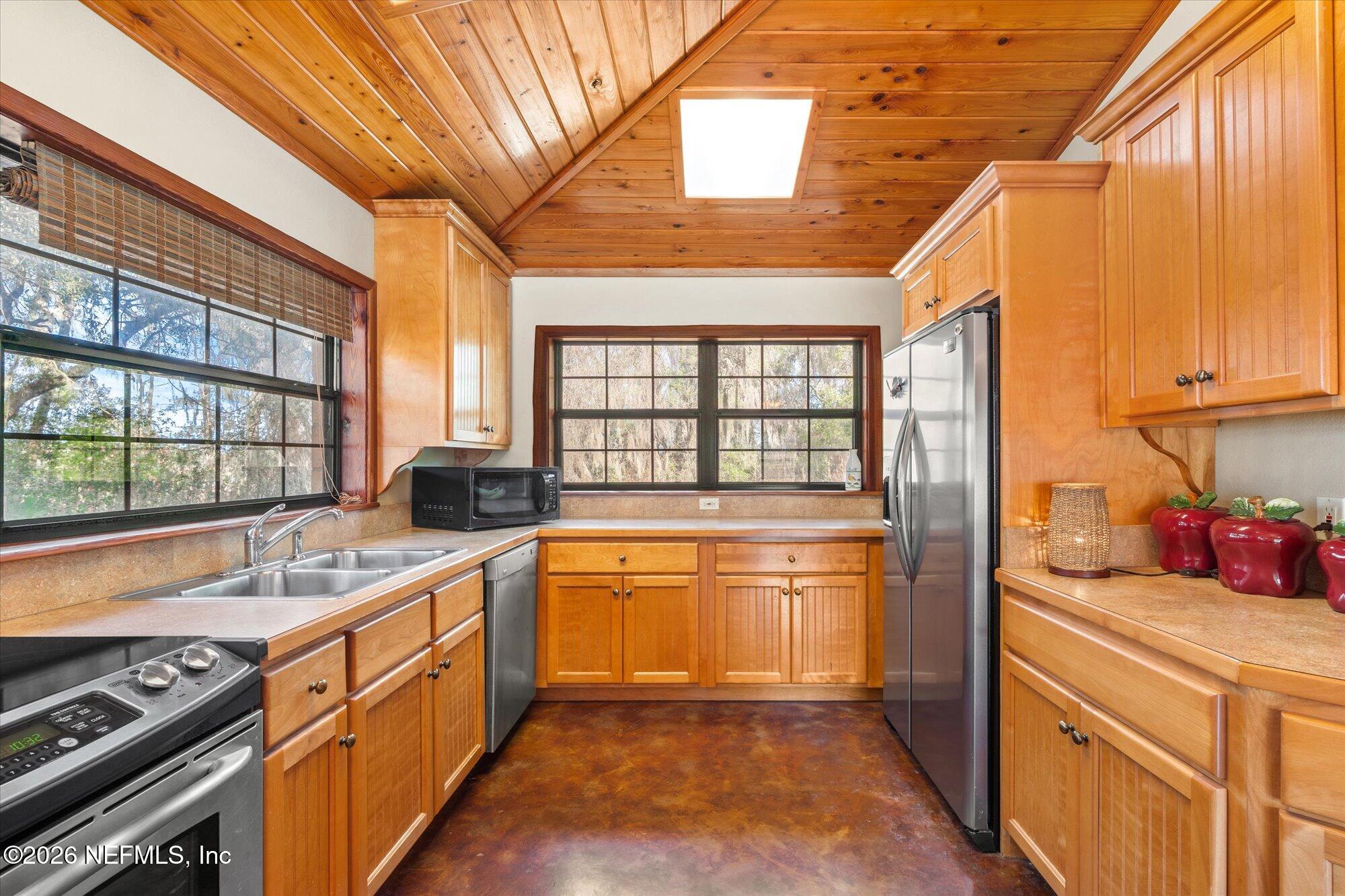 118 Hooks Lake Road Melrose, FL 32666 - Photo 19 of 61 a kitchen that has a sink and a stove