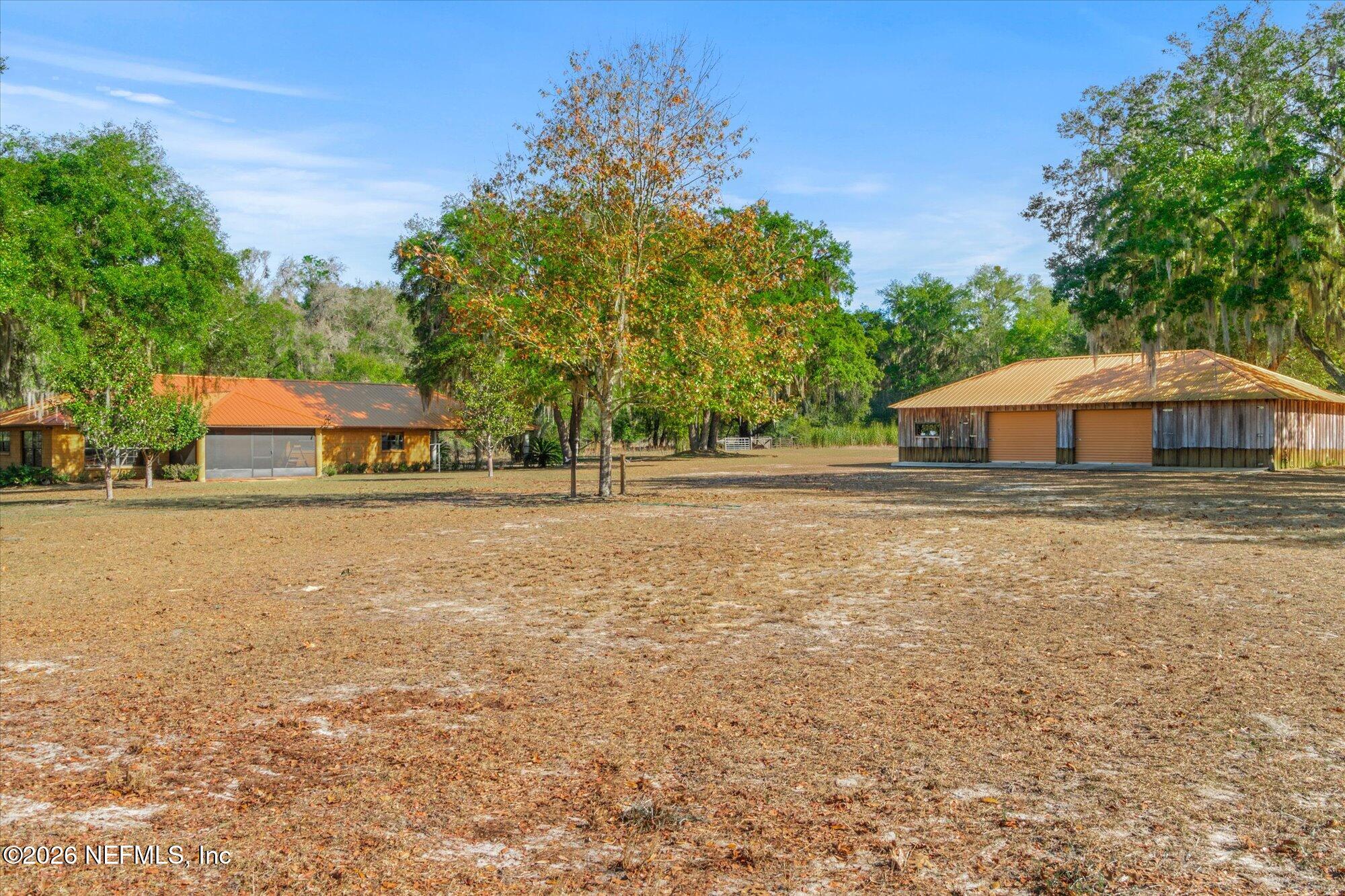 118 Hooks Lake Road Melrose, FL 32666 - Photo 46 of 61 a house with trees in the background