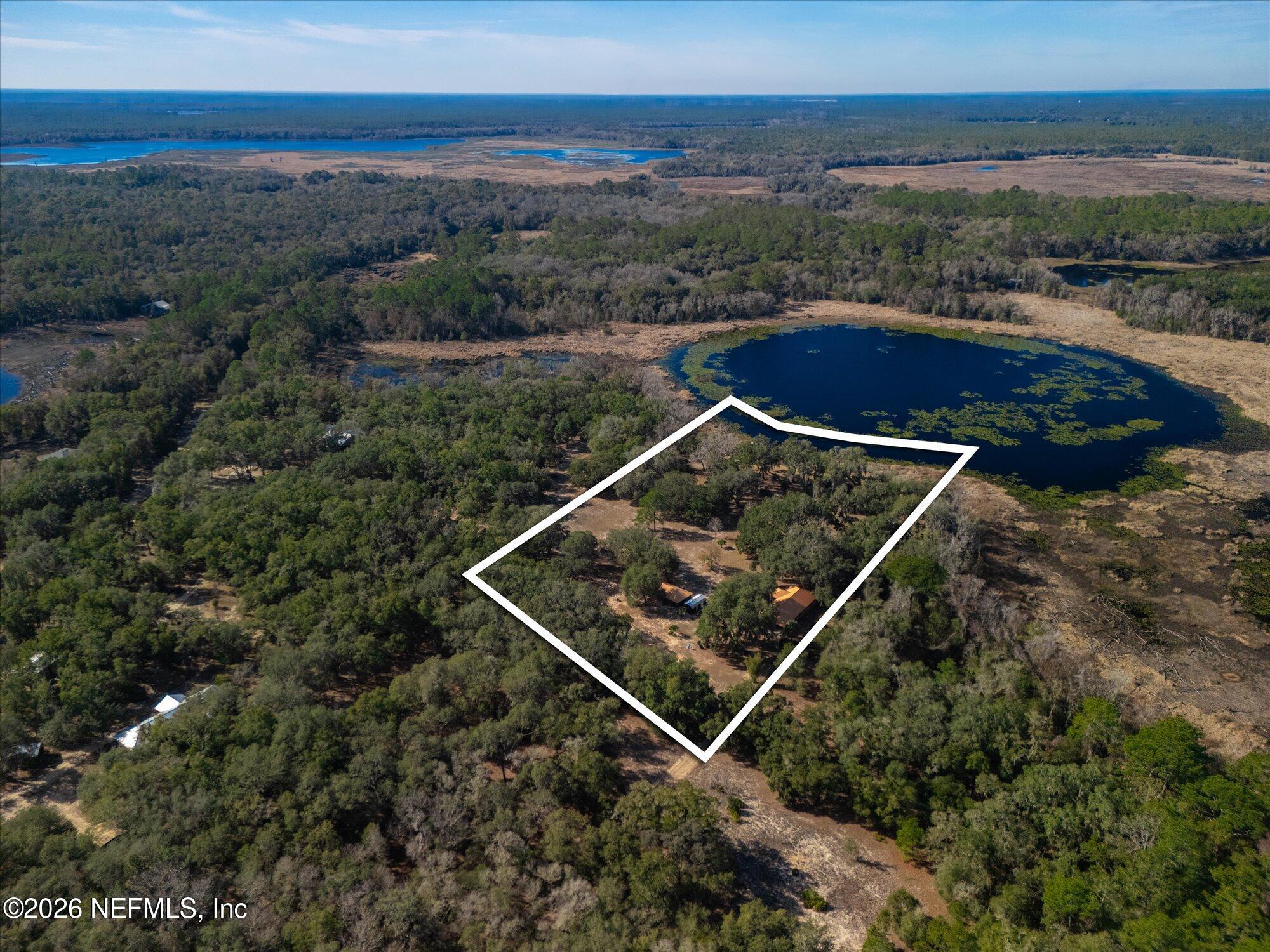 118 Hooks Lake Road Melrose, FL 32666 - Photo 49 of 61 an aerial view of house with backyard space and city view