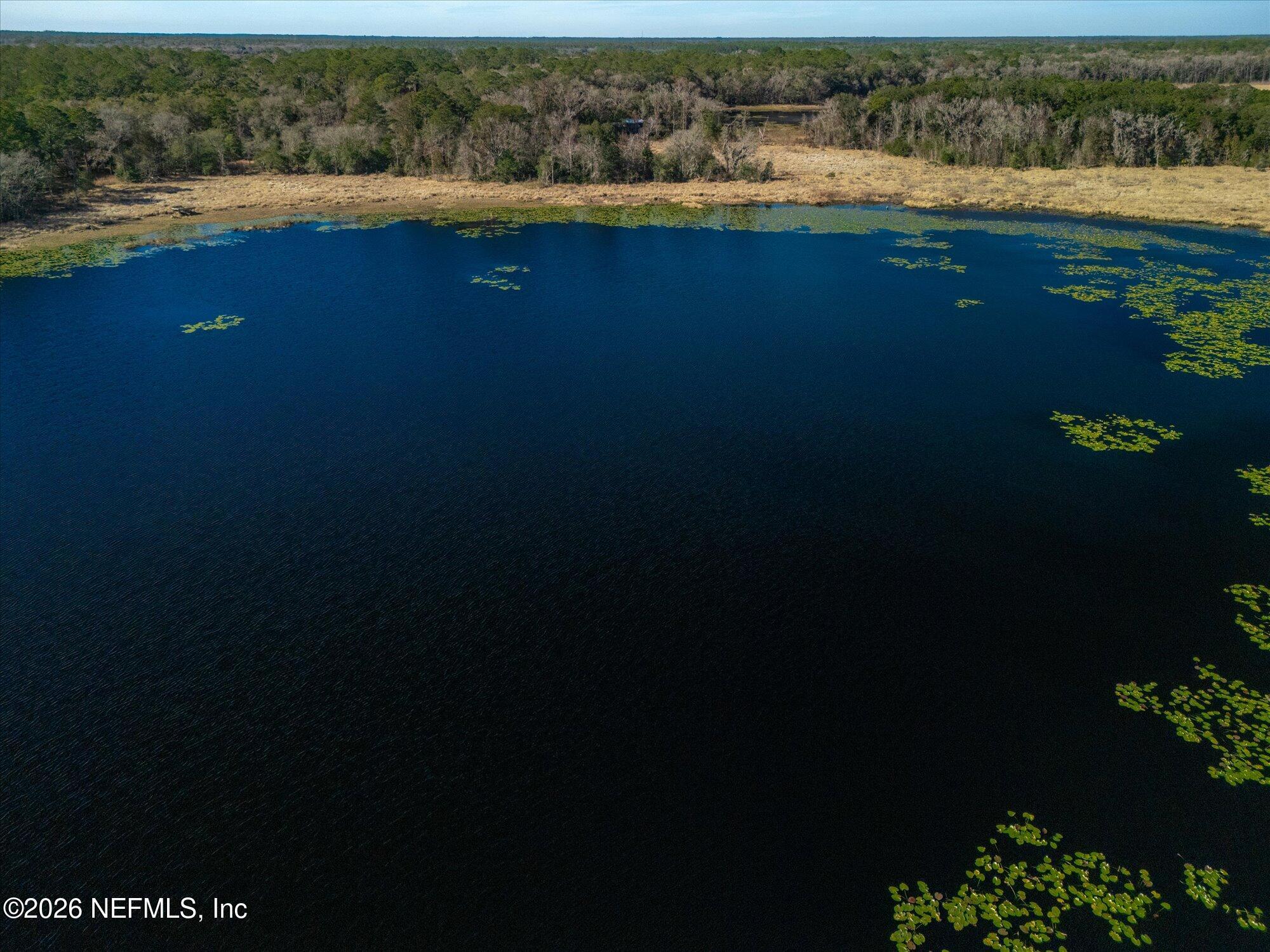 118 Hooks Lake Road Melrose, FL 32666 - Photo 60 of 61 a view of a lake with outdoor space