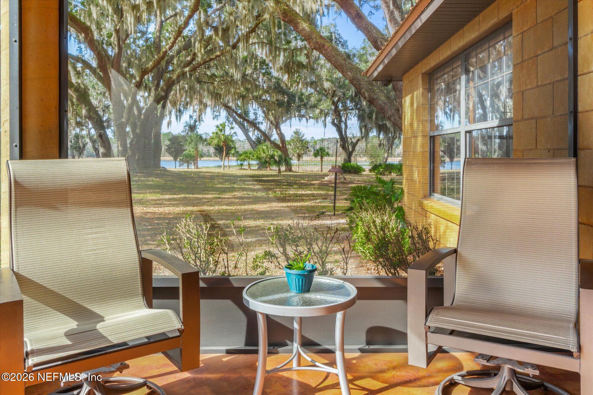 118 Hooks Lake Road Melrose, FL 32666 - Photo 7 of 61 a view of a chairs and table in the patio