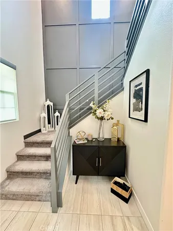 a view of staircase with white walls