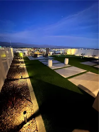 a view of swimming pool from a balcony