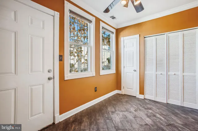 a view of entryway with wooden floor