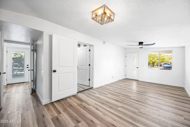 a view of a small space with racks on the wall