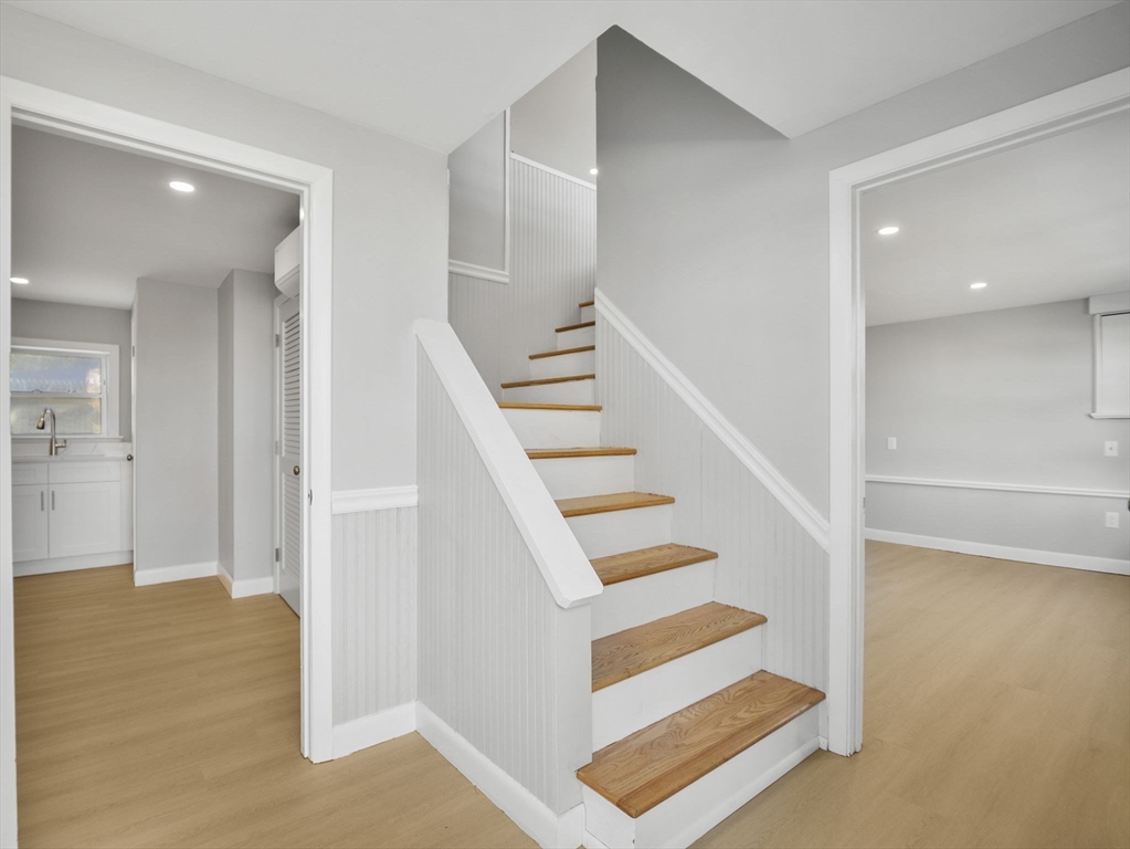 27 Hodgkins Road Rockport, MA 01966 - Photo 17 of 35 a view of entryway and hall with wooden floor