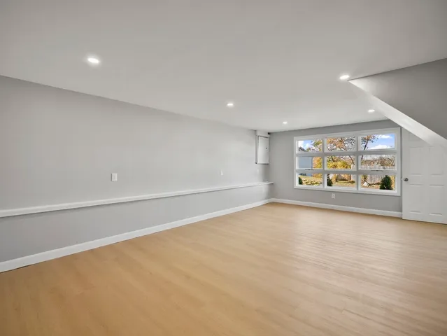 an empty room with window