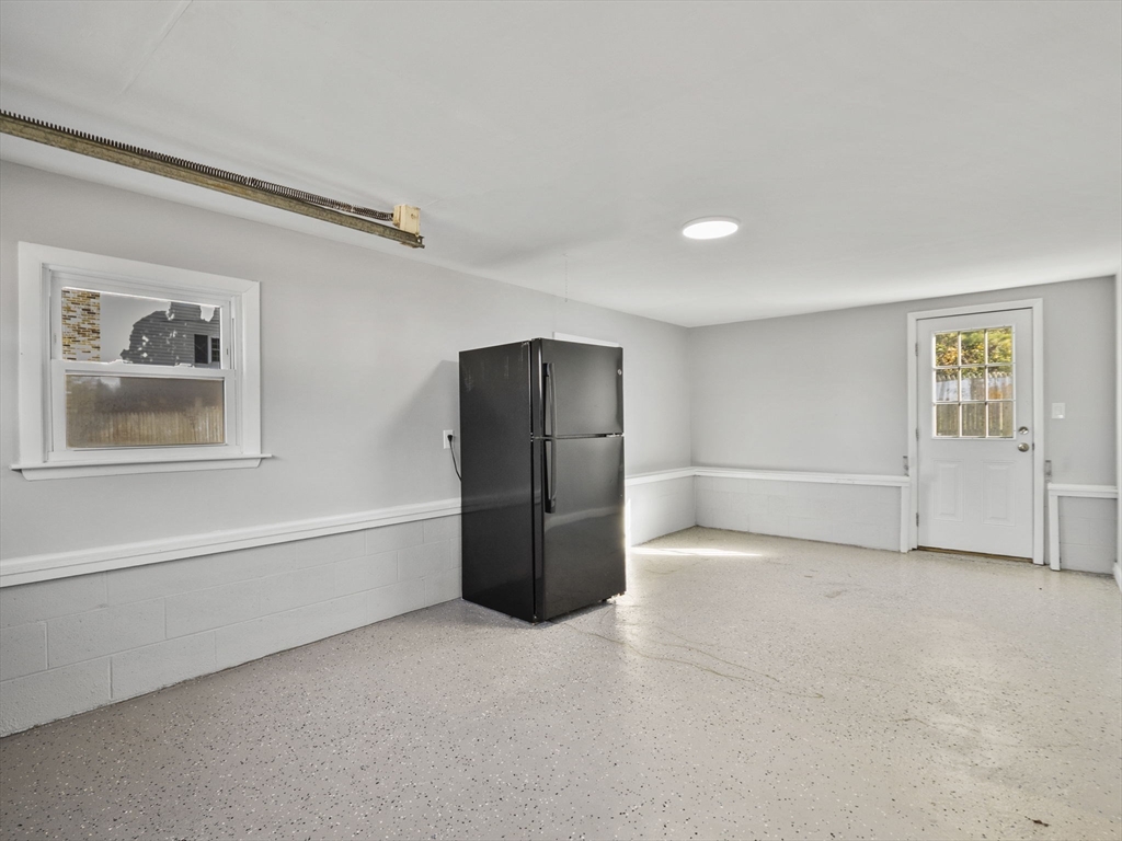 27 Hodgkins Road Rockport, MA 01966 - Photo 32 of 35 a view of an empty room with a cabinet and a window