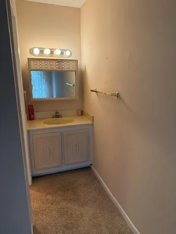 a utility room with a sink a washer and dryer