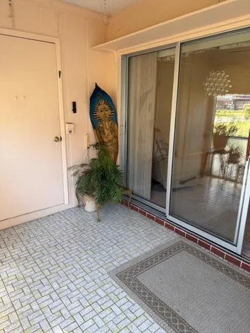 an empty room with mirror