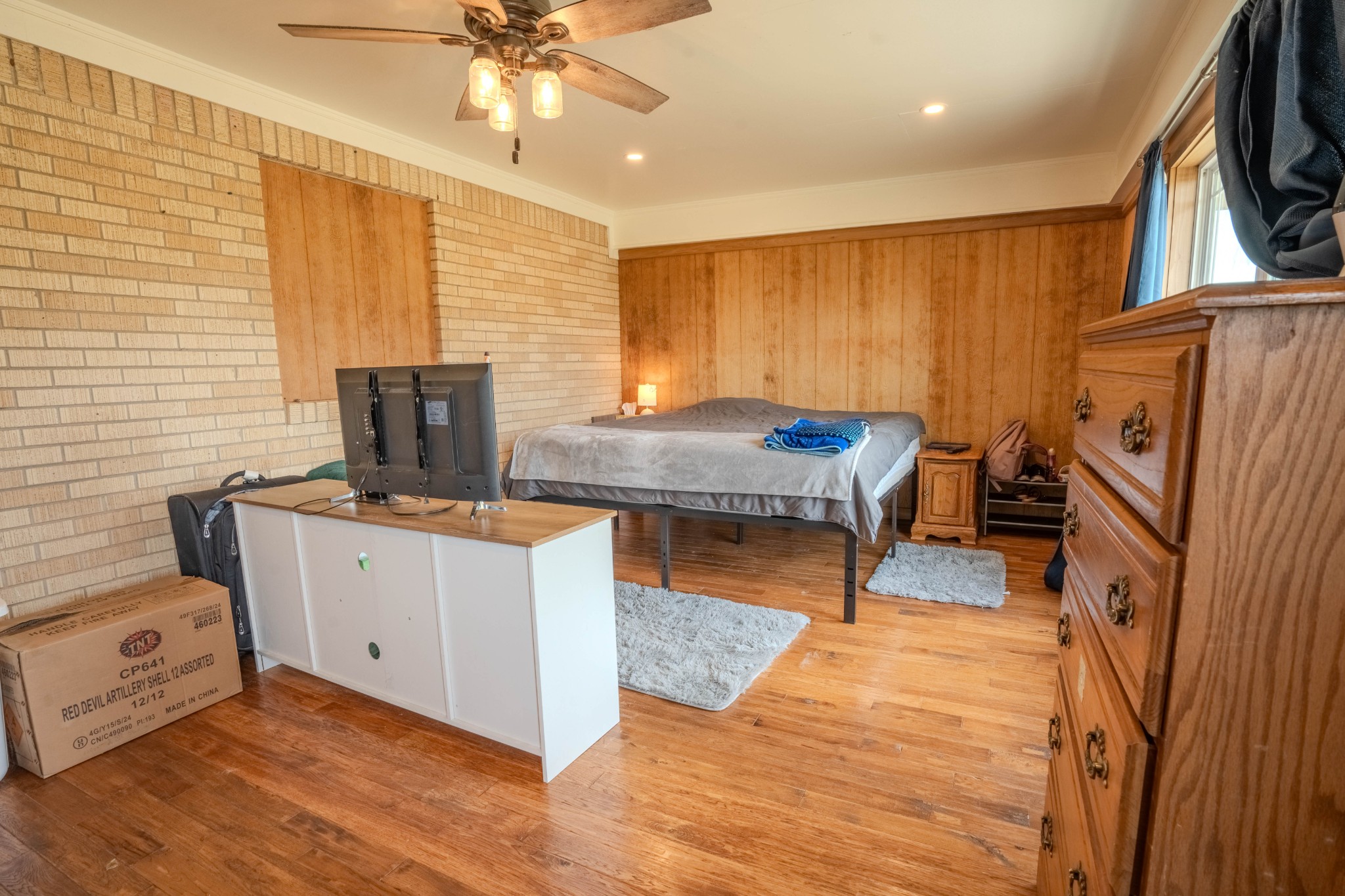 97 Ramah Road Leoma, TN 38468 - Photo 15 of 43 a room with furniture a flat screen tv and a fireplace