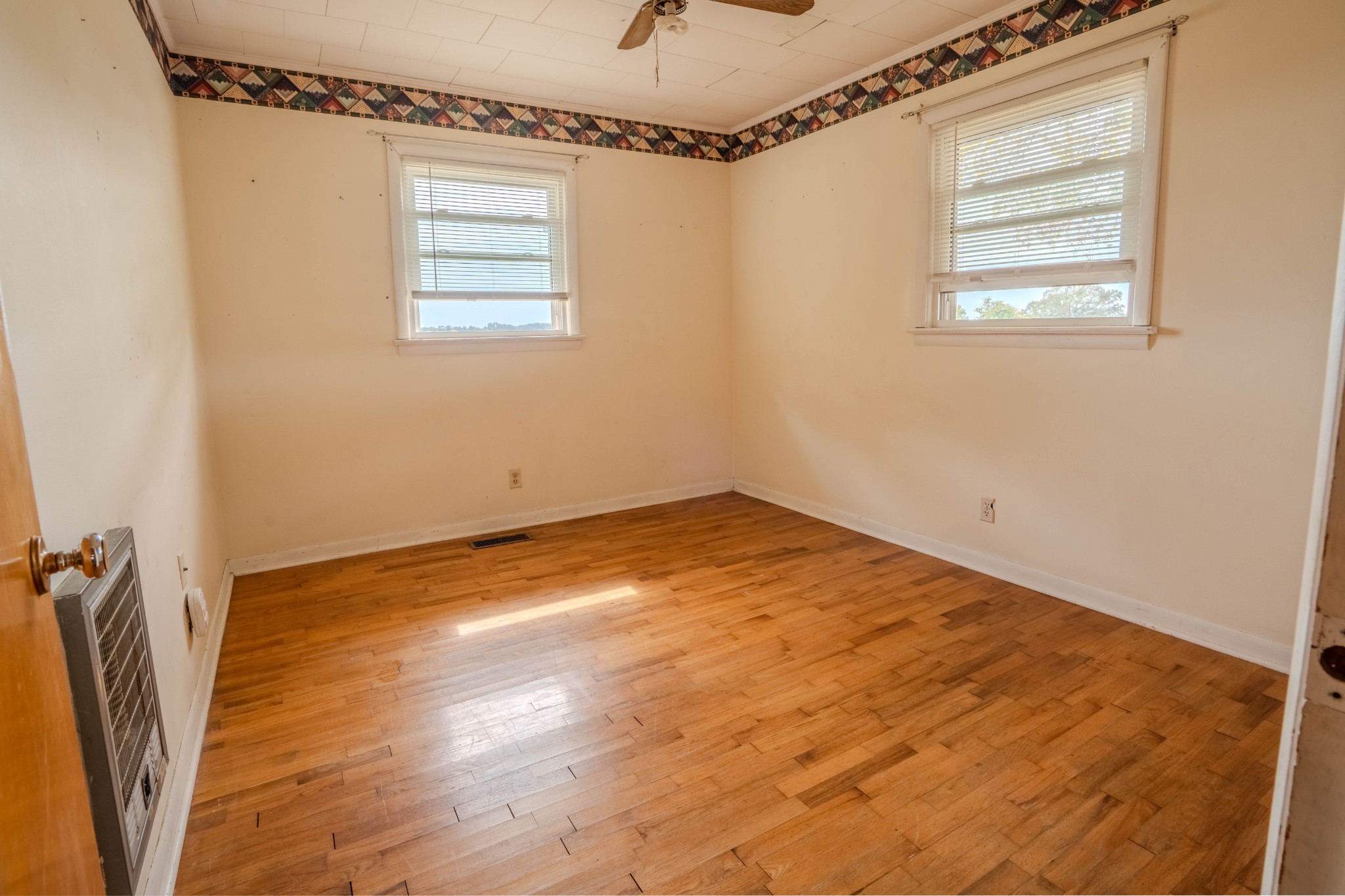 97 Ramah Road Leoma, TN 38468 - Photo 18 of 43 a view of empty room with wooden floor and fan