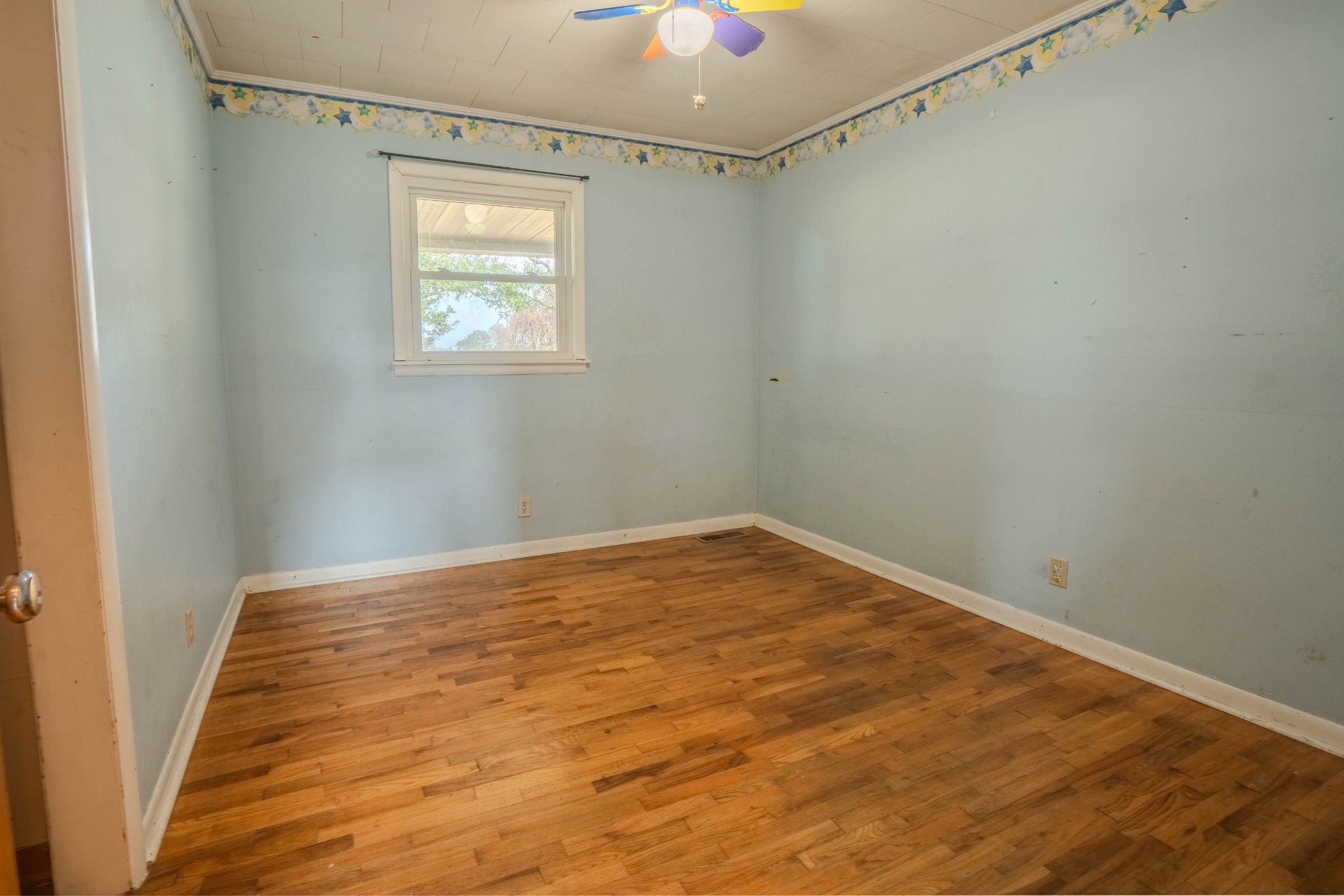 97 Ramah Road Leoma, TN 38468 - Photo 20 of 43 a view of a room with wooden floor and windows