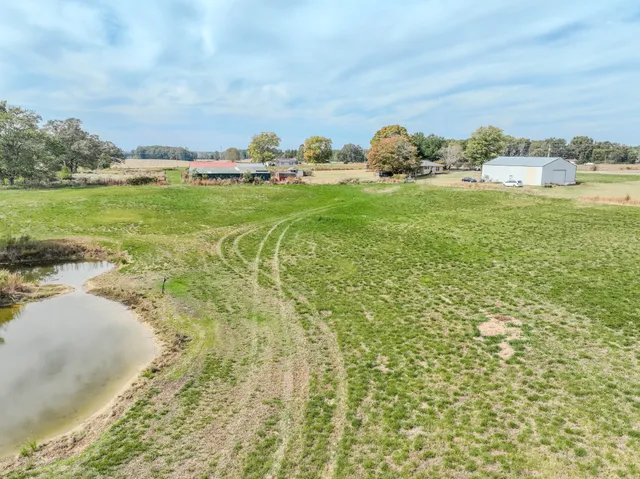 a view of a lake with a big yard