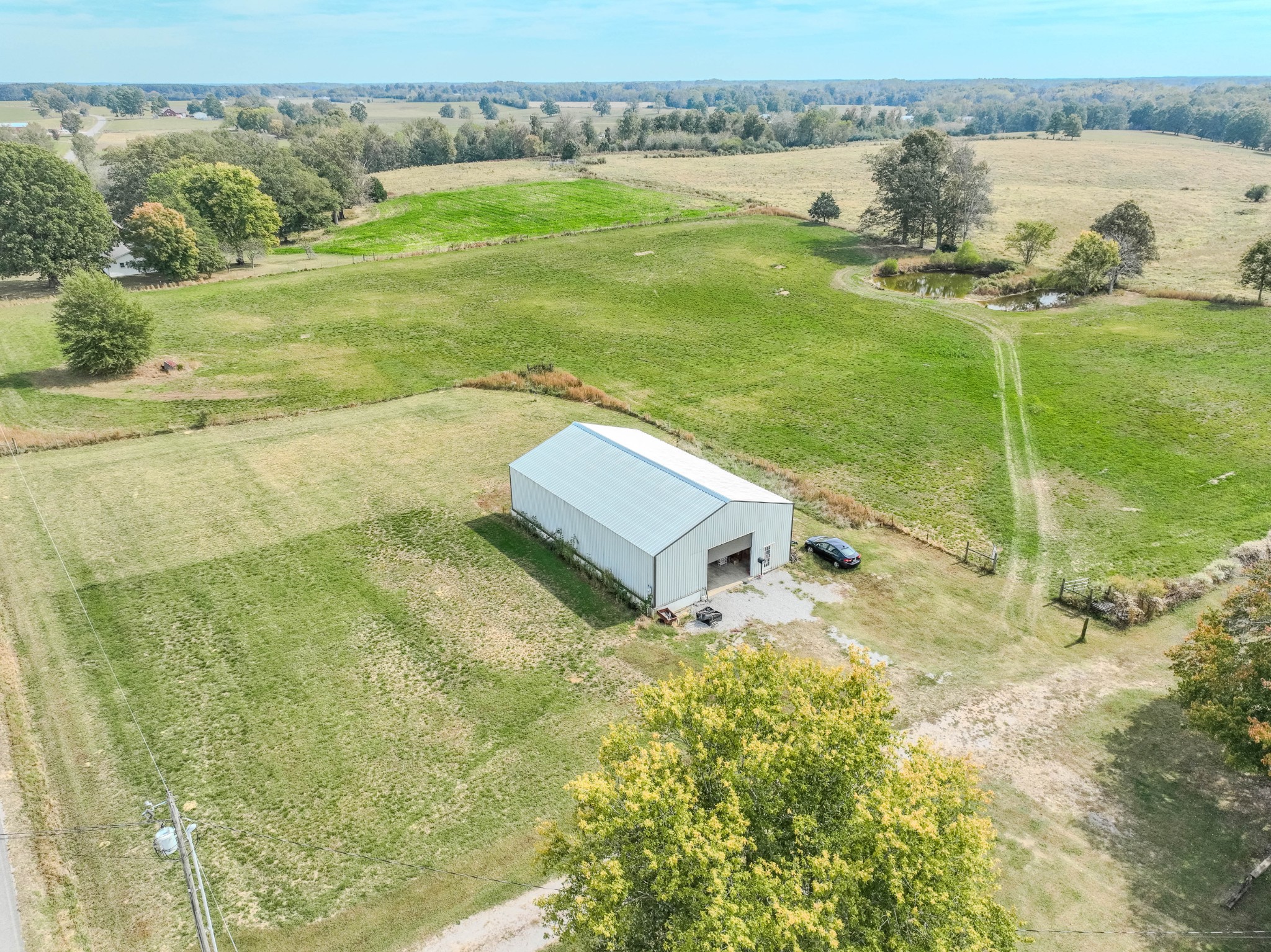 97 Ramah Road Leoma, TN 38468 - Photo 28 of 43 a view of a lake with a yard