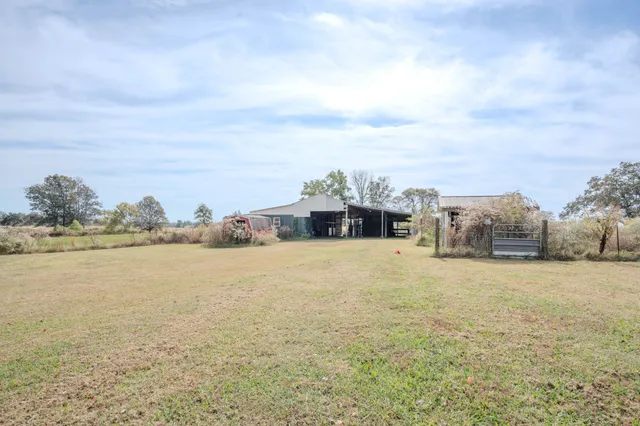 front view of a house with a big yard