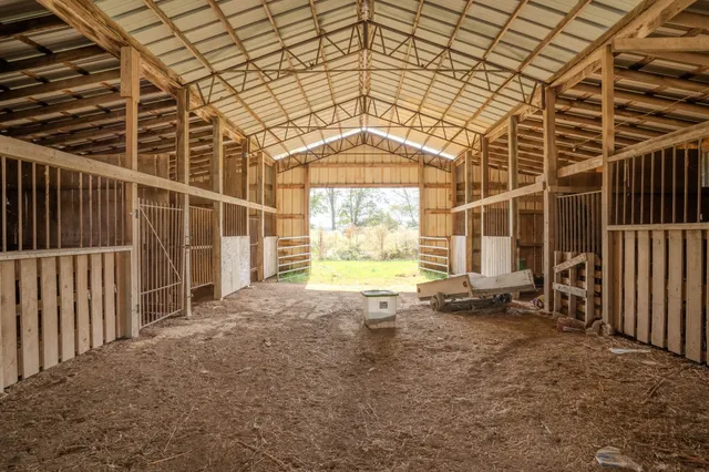 a view of a room with wooden walls