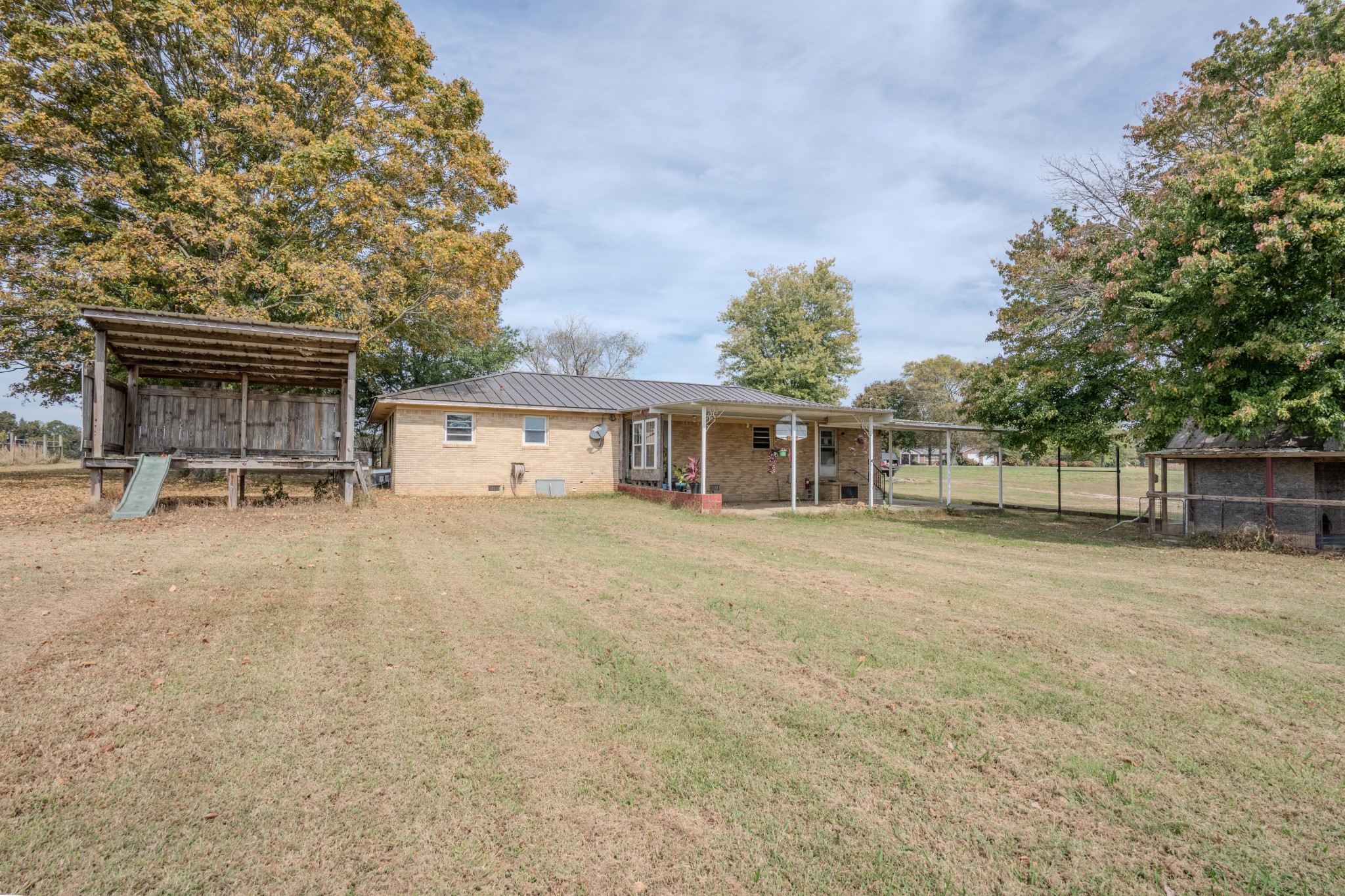 97 Ramah Road Leoma, TN 38468 - Photo 7 of 43 front view of a house with a yard and a large tree