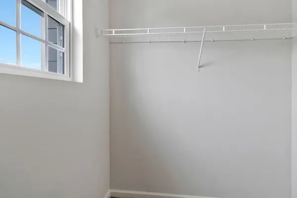 a view of a room with racks on the wall