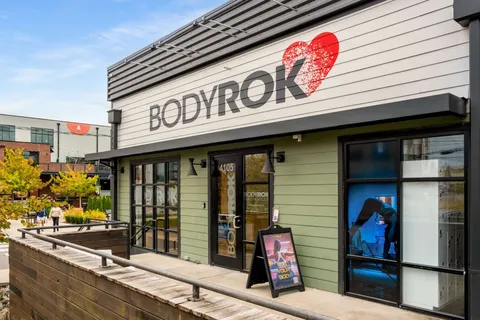 a view of a chairs and window in the balcony