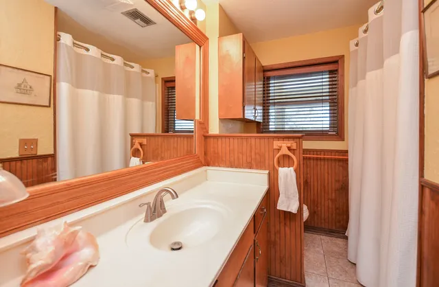 a bathroom with a sink and a bathtub