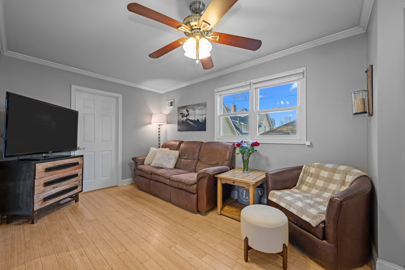 311 Ohio Avenue St. Charles, IL 60174 - Photo 4 of 20 a living room with furniture and a flat screen tv