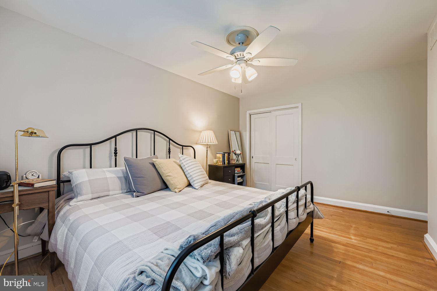 1552 Cottage Lane Towson, MD 21286 - Photo 15 of 32 a bedroom with a bed and a chandelier