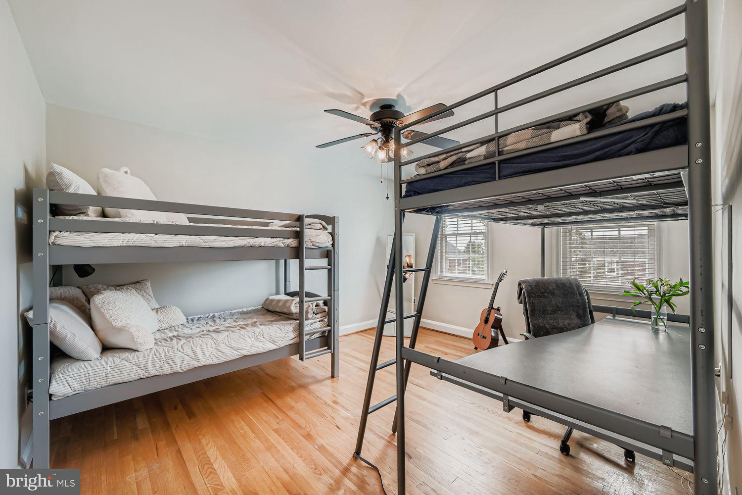 1552 Cottage Lane Towson, MD 21286 - Photo 18 of 32 a bedroom with a bed and a window