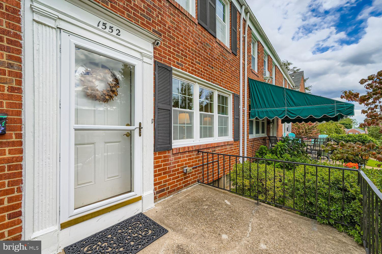 1552 Cottage Lane Towson, MD 21286 - Photo 3 of 32 a view of a house with a small porch