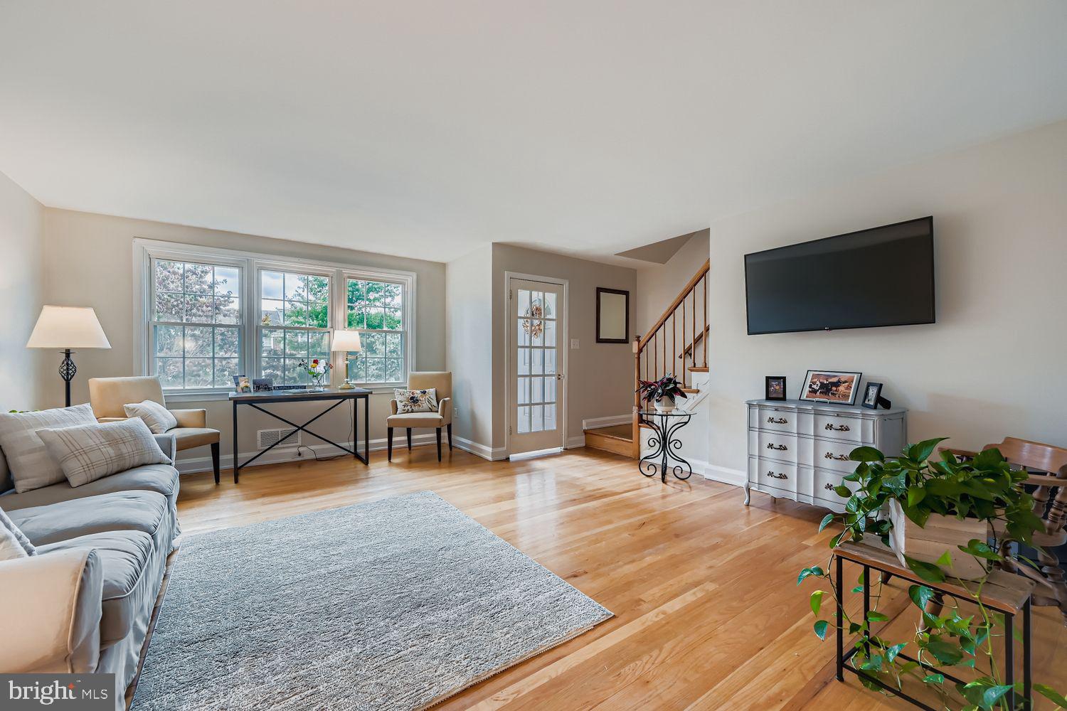 1552 Cottage Lane Towson, MD 21286 - Photo 4 of 32 a living room with furniture and a flat screen tv
