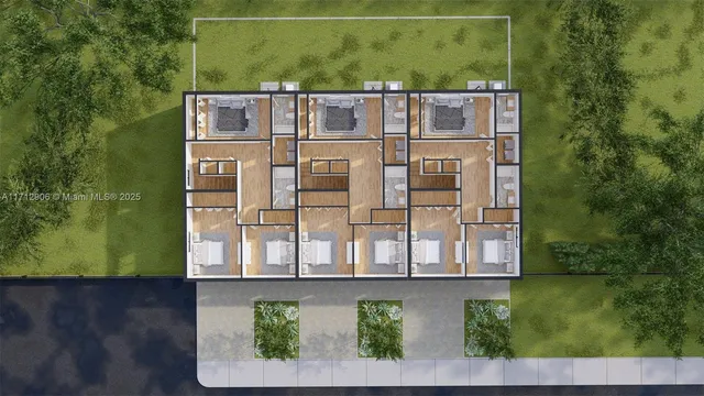 a view of a brick building next to a yard