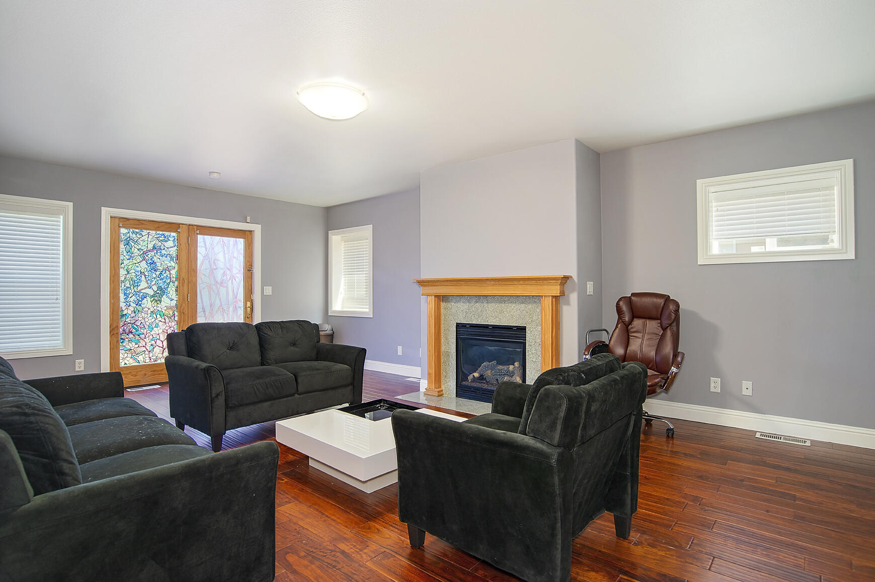 449 Quail Run Eagle Point, OR 97524 - Photo 23 of 35 a living room with furniture and a fireplace