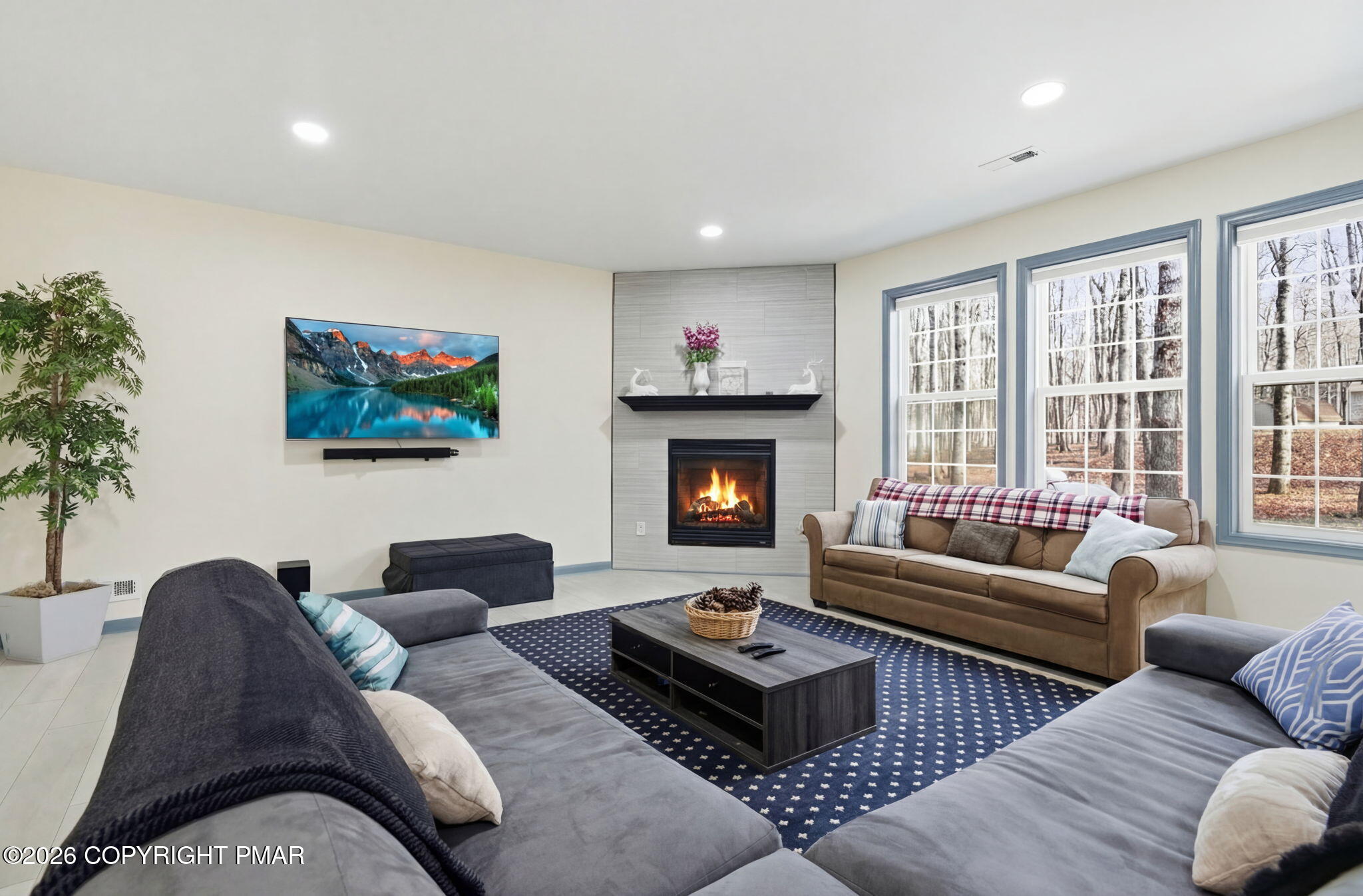 74 Buckhill Road Albrightsville, PA 18210 - Photo 11 of 65 a living room with furniture fireplace and a large window