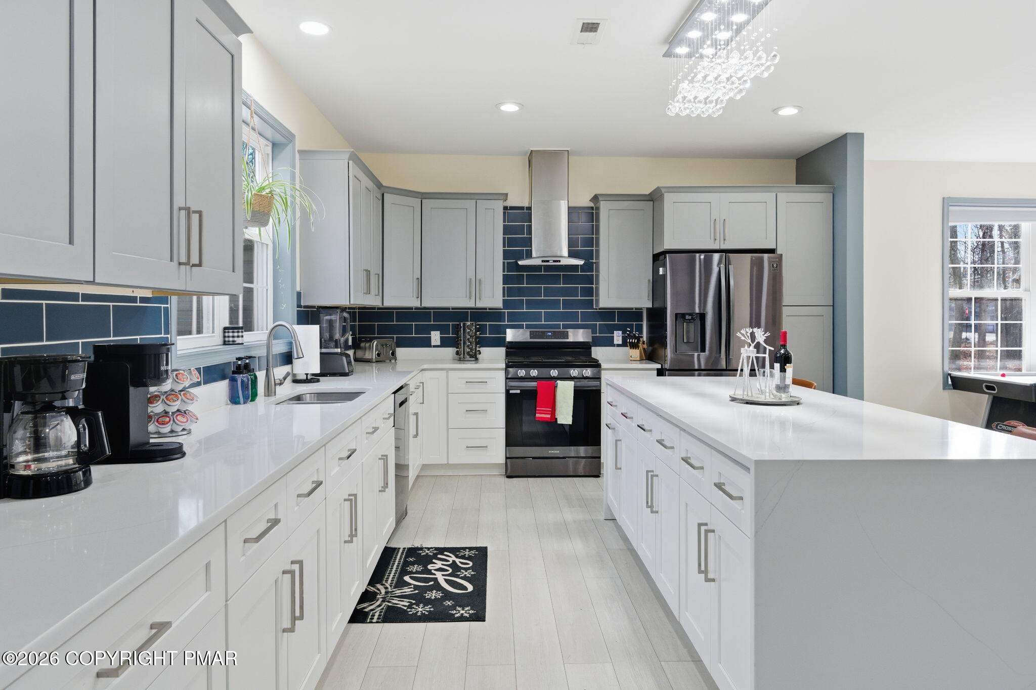 74 Buckhill Road Albrightsville, PA 18210 - Photo 5 of 65 a kitchen with kitchen island granite countertop a sink a counter top space stainless steel appliances and cabinets