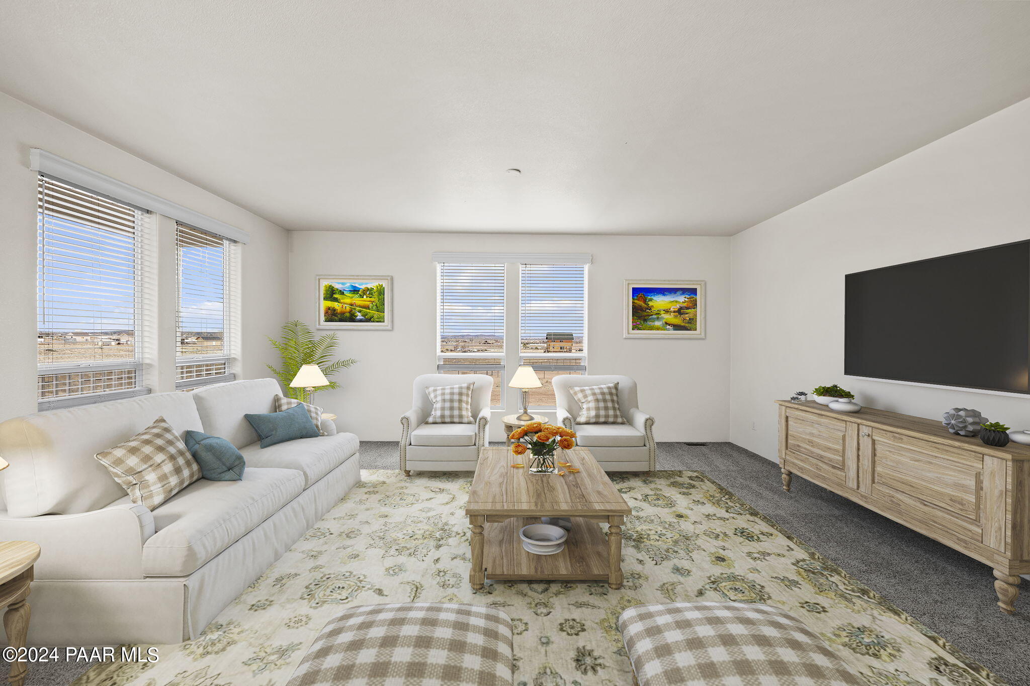 25784 Riesling Lane Paulden, AZ 86334 - Photo 2 of 15 a living room with furniture and a flat screen tv