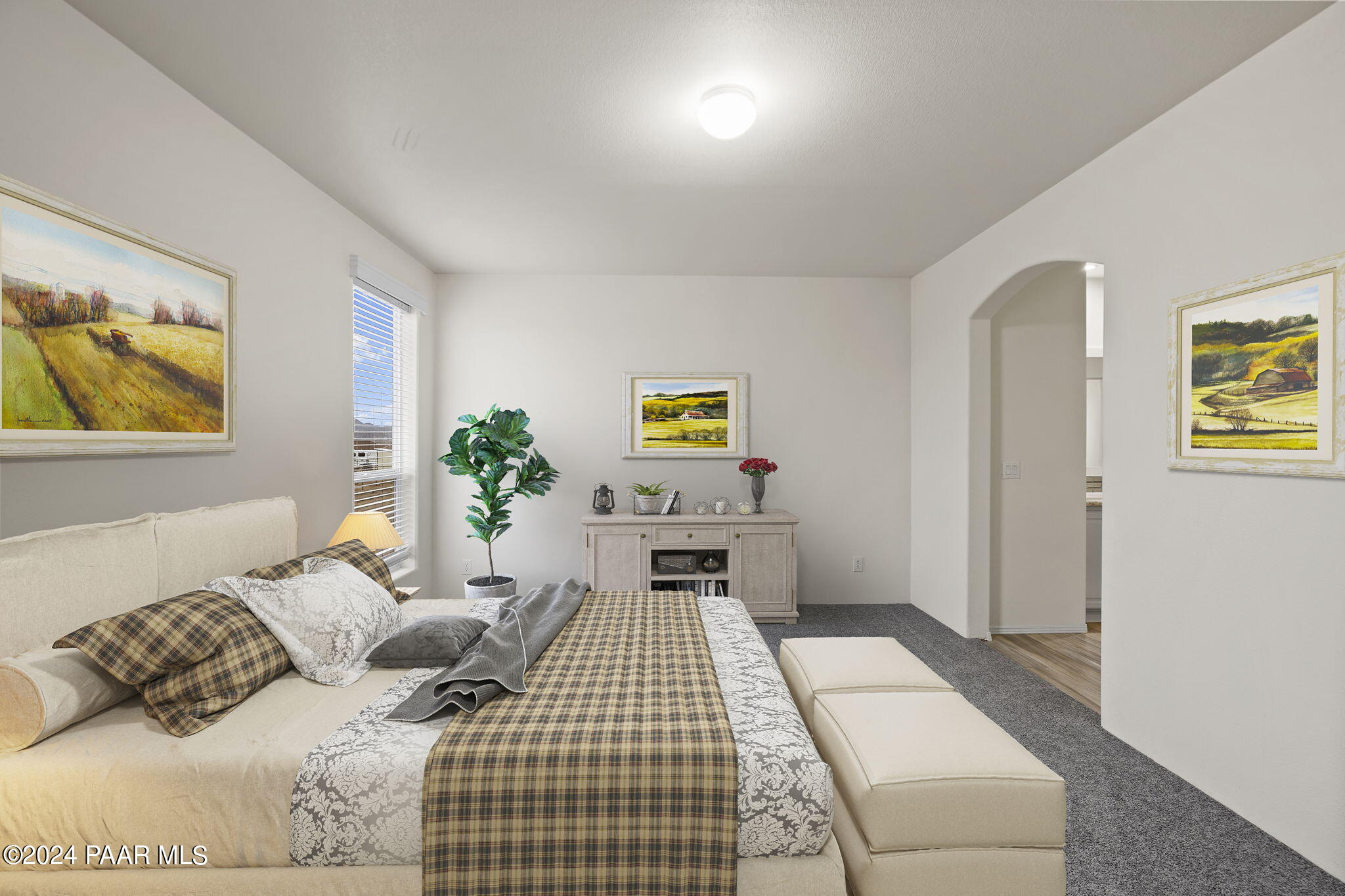 25784 Riesling Lane Paulden, AZ 86334 - Photo 4 of 15 a bedroom with a bed and painting on the wall