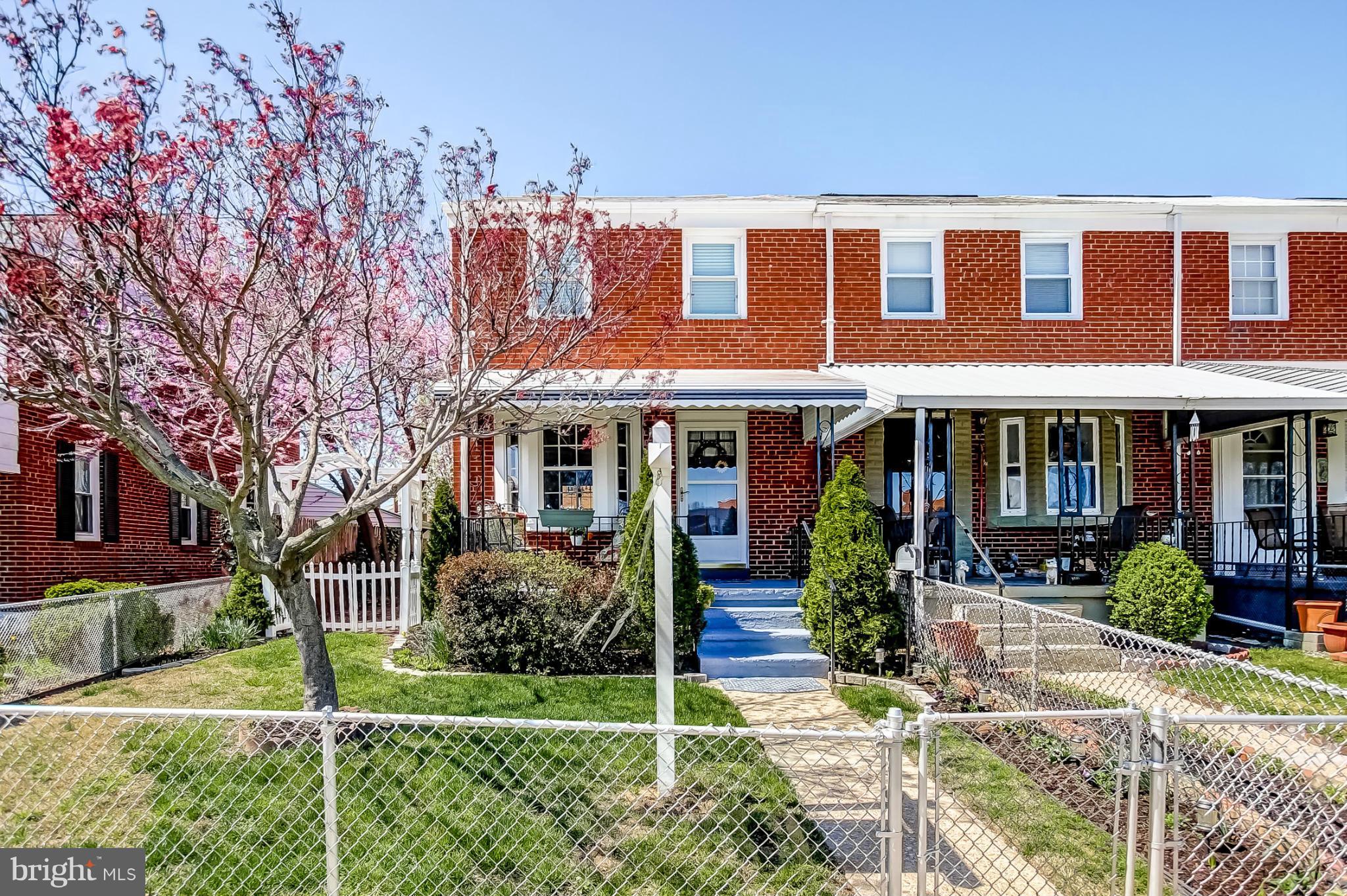 8329 Kavanagh Road Baltimore, MD 21222 - Photo 1 of 30 a front view of house with yard and green space