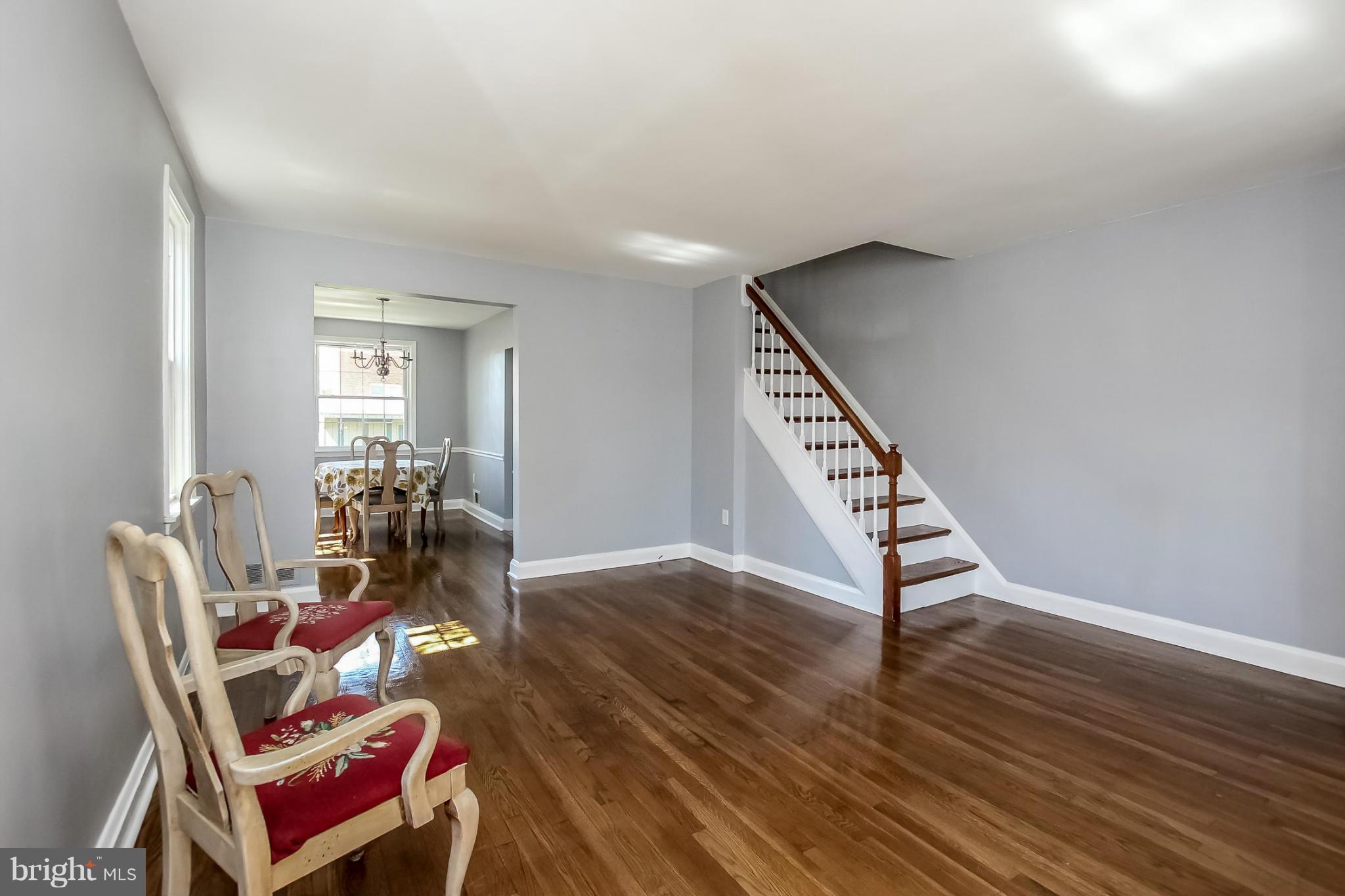 8329 Kavanagh Road Baltimore, MD 21222 - Photo 5 of 30 a view of a livingroom with furniture and wooden floor
