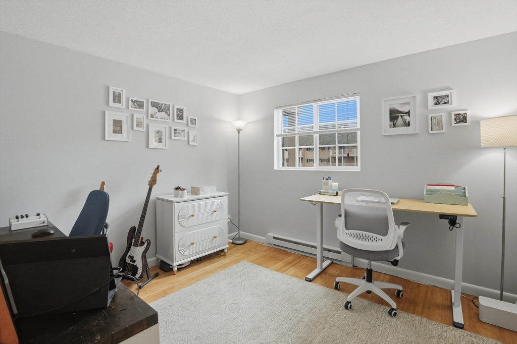 200 Manning Street, Unit 11C Hudson, MA 01749 - Photo 15 of 30 a view of a workspace with furniture and a window